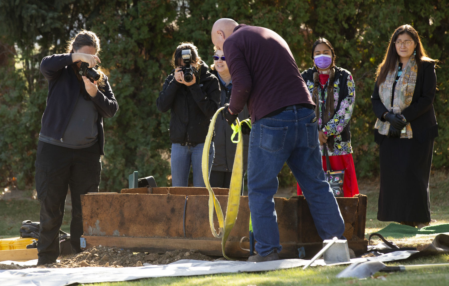 Investigators take photographs